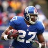 EAST RUTHERFORD, NJ - DECEMBER 07:  Brandon Jacobs #27 of the New York Giants runs against the Philadelphia Eagles during their game on December 7, 2008 at Giants Stadium in East Rutherford, New Jersey.  (Photo by Al Bello/Getty Images)