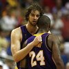 ORLANDO, FL - JUNE 11:  Pau Gasol #16 hugs Kobe Bryant #24 of the Los Angeles Lakers in the final moments of the Lakers' overtime win over the Orlando Magic in Game Four of the 2009 NBA Finals on June 11, 2009 at Amway Arena in Orlando, Florida.  NOTE TO 
