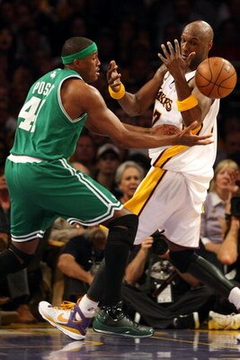 LOS ANGELES, CA - JUNE 15:  Lamar Odonm #7 of the Los Angeles Lakers loses control of the ball under pressure from James Posey #41 of the Boston Celtics in the first half of Game Five of the 2008 NBA Finals on June 15, 2008 at Staples Center in Los Angele
