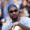 SAN ANTONIO - JUNE 17:  Tim Duncan of the San Antonio Spurs holds the Larry O'Brien trophy during the NBA championship parade down the San Antonio River walk June 17, 2007 in San Antonio, Texas. NOTE TO USER: User expressly acknowledges and agrees that, b
