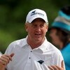 CHARLOTTE,NC- MAY 1: Head Coach John Fox (R) smiles as he talks to some fans after the minicamp practice  at the team's practice facility on May 1, 2009 in Charlotte, North Carolina. (Photo by Steve Dykes/Getty Images)