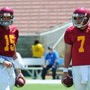 LOS ANGELES, CA - APRIL 25:  Quarterback Aaron Corp #15 and Matt Barkley #7 of the USC Trojans white team talk before the spring game on April 25, 2009 at the Los Angeles Memorial Coliseum in Los Angeles, California.  (Photo by Matt Kincaid/Getty Images)