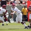 LOS ANGELES, CA - APRIL 25: Quarterback Matt Barkley #7 of the USC Trojans hands off the ball during the spring game on April 25, 2009 at the Los Angeles Memorial Coliseum in Los Angeles, California.  The cardinal team won 16-10.  (Photo by Jeff Golden/Ge