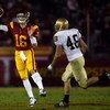 LOS ANGELES, CA - NOVEMBER 29:  Mitch Mustain #16 of the USC Trojans passes in front of Steve Quinn #48 of the Notre Dame Fighting Irsh during the fourth quarter at the Coliseum on November 29, 2008 in Los Angeles, California.  (Photo by Harry How/Getty I