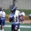 4 May 2001:  LaDainian Tomlinson #21 runs with the ball during the San Diego Chargers Mini Camp at Murphy Canyon in San Diego, California.Mandatory Credit: Todd Warshaw  /Allsport