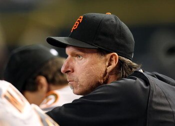 PHOENIX - JUNE 11:  Pitcher Randy Johnson #51 of the San Francisco Giants watches from the dugout during the major league baseball game against the Arizona Diamondbacks at Chase Field on June 11, 2009 in Phoenix, Arizona.  The Diamondbacks defeated the Gi