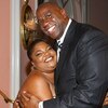 LOS ANGELES, CA - MAY 06:  Former NBA player Earvin 'Magic' Johnson (R) hugs comedian Mo'Nique during the USA TODAY Hollywood Hero honoring Magic Johnson at the Beverly Hills Hotel on May 6, 2008 in Los Angeles, California.  (Photo by Alberto E. Rodriguez