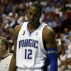 ORLANDO, FL - JUNE 14:  Dwight Howard #12 of the Orlando Magic looks down in the fourth quarter as the Magic trail the Los Angeles Lakers in Game Five of the 2009 NBA Finals on June 14, 2009 at Amway Arena in Orlando, Florida.  NOTE TO USER:  User express