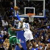 ORLANDO, FL - MAY 14:   Dwight Howard #12 of the Orlando Magic blocks the shot of Glen Davis #11 of the Boston Celtics in Game Six of the Eastern Conference Semifinals during the 2009 NBA Playoffs at Amway Arena on May 14, 2009 in Orlando, Florida.  NOTE 