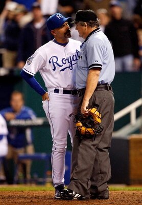 KANSAS CITY, MO - MAY 05:  Manager Trey Hillman #22 of the Kansas City Royals argues with home plate umpire Jerry Crawford in the fifth inning during action against the Chicago White Sox on May 5, 2009 at Kauffman Stadium in Kansas City, Missouri.  (Photo
