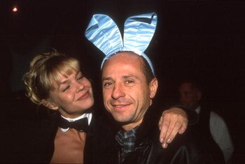 17 Jan 2001:  CART FedEx Championship Series driver Roberto Moreno poses with a Playboy Playmate during the CART Party at the Playboy Mansion in Los Angeles, California. Mandatory Credit: Jon Ferrey/ALLSPORT