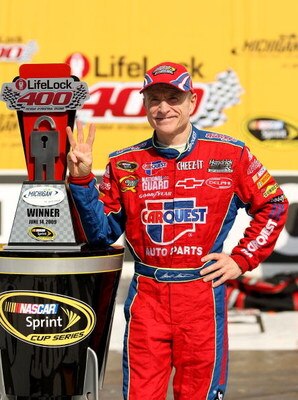 BROOKLYN, MI - JUNE 14:  Mark Martin, driver of the #5 CARQUEST/Kellogg's Chevrolet, celebrates in victory lane after winning the NASCAR Sprint Cup Series LifeLock 400 at Michigan International Speedway on June 14, 2009 in Brooklyn, Michigan.  (Photo by E