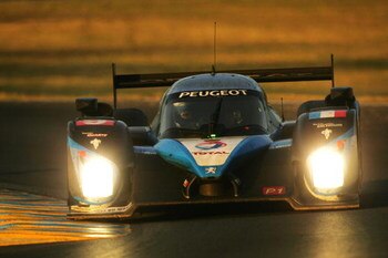 LE MANS, FRANCE - JUNE 14:  Marc Gene of Spain and Peugeot Sport Total 908 HDi FAP drives during the 77th running of the Le Mans 24 Hour race at the Circuit des 24 Heures du Mans on June 14, 2009 in Le Mans, France.  (Photo by Ker Robertson/Getty Images)