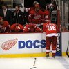 DETROIT - JUNE 12:  Brad Stuart #23, second from left, and Nicklas Lidstrom #5 of the Detroit Red Wings look on dejectedly after Game Seven of the 2009 NHL Stanley Cup Finals against the Pittsburgh Penguins at Joe Louis Arena on June 12, 2009 in Detroit, 