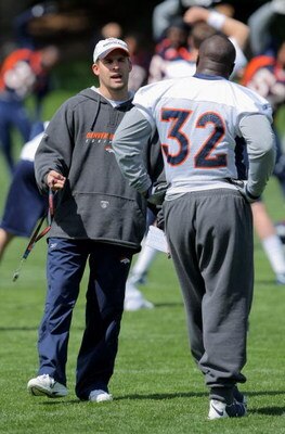 ENGLEWOOD, CO - MAY 03:  Head coach Josh McDaniels of the Denver Broncos chats with running back LaMont Jordan #32 during minicamp at the Broncos training facility on May 3, 2009 in Englewood, Colorado.  (Photo by Doug Pensinger/Getty Images)