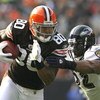 CLEVELAND - NOVEMBER 2:  Evan Oglesby #25 of the Baltimore Ravens hits Kellen Winslow #80 of the Cleveland Browns during the third quarter of their NFL game at Cleveland Browns Stadium November 2, 2008 in Cleveland, Ohio.  (Photo by Matt Sullivan/Getty Im