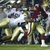 CHESTNUT HILL, MA - NOVEMBER 8: Montel Harris #41 of the Boston College Eagles gain yardage against Brian Smith #58 of the Notre Dame Fighting Irish on November 8, 2008 at Alumni Stadium in Chestnut Hill, Massachusetts.(Photo by Jim Rogash/Getty Images)