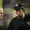 COLUMBIA, SC - SEPTEMBER 1:  Head coach Steve Spurrier of the South Carolina Gamecocks talks to assistant coach John Thompson against the University of Central Florida Golden Knights on September 1, 2005 at Williams-Brice Stadium in Columbia, South Caroli