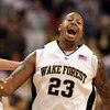 WINSTON-SALEM, NC - FEBRUARY 26: James Johnson #23 of the Wake Forest Demon Deacons reacts to a dunk against the North Carolina State Wolfpack during the Demon Deacons 85-78 victory at Lawrence Joel Coliseum on February 26, 2009 in Winston-Salem, North Ca