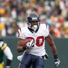 GREEN BAY - DECEMBER 7:  Steve Slaton #20 of the Houston Texans carries the ball during the game against the Green Bay Packers at Lambeau Field on December 7, 2008 in Green Bay, Wisconsin.  (Photo by: Jeff Gross/Getty Images)