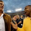 TAMPA, FL - FEBRUARY 01:  (L-R) Hall of famers John Elway and Lynn Swann on the field prior to Super Bowl XLIII between the Arizona Cardinals and the Pittsburgh Steelers on February 1, 2009 at Raymond James Stadium in Tampa, Florida.  (Photo by Jamie Squi