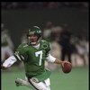 3 Dec 1995:  Quarterback Boomer Esiason #7 of the New York Jets scrambles out of the pocket and looks downfield for an open receiver during the game against the St. Louis Rams at The Meadowlands in East Rutherford, New Jersey.  The Rams defeated the Jets
