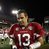 TAMPA, FL - FEBRUARY 01:  Kurt Warner #13 of the Arizona Cardinals takes his gloves off as he leaves the field after the Cardinals lost 27-23 against the Pittsburgh Steelers during Super Bowl XLIII on February 1, 2009 at Raymond James Stadium in Tampa, Fl