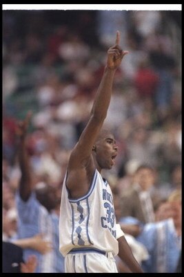9 Mar 1997:  Antawn Jamison #33 of the Univeristy of North Carolina raises a number one sign during the Tarheels 64-54 win over North Carolina State to become the ACC Tournament Champions at Greensboro Coliseum in Greensboro, North Carolina. Mandatory Cre
