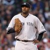 BOSTON - JUNE 11: CC Sabathia #52 of  New York Yankees reacts against the Boston Red Sox at Fenway Park on June 11, 2009 in Boston, Massachusetts.  (Photo by Jim Rogash/Getty Images)