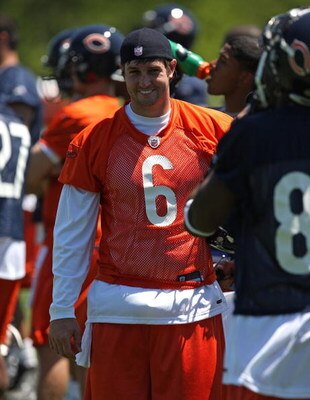 LAKE FOREST, IL - MAY 20: Jay Cutler #6 of the Chicago Bears smiles at a teammate during an organized team activity (OTA) practice on May 20, 2009 at Halas Hall in Lake Forest, Illinois. (Photo by Jonathan Daniel/Getty Images)