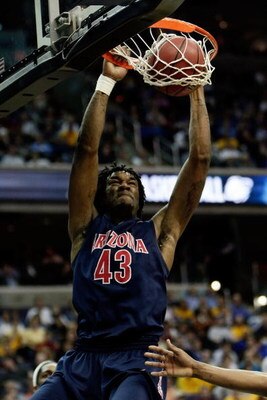 WASHINGTON - MARCH 20:  Jordan Hill #43 of the Arizona Wildcats dunks the ball against the West Virginia Mountaineers during the first round of the West Regional as part of the 2008 NCAA Men's Basketball Tournament at the Verizon Center on March 20, 2008 