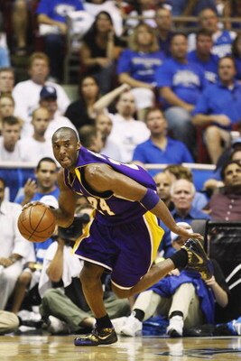 ORLANDO, FL - JUNE 14:  Kobe Bryant #24 of the Los Angeles Lakers moves the ball against the Orlando Magic in Game Five of the 2009 NBA Finals on June 14, 2009 at Amway Arena in Orlando, Florida. The Lakers won 99-86.  NOTE TO USER:  User expressly acknow