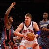 NEW YORK - MARCH 07:  David Lee #42 of the New York Knicks drives to the basket against the Charlotte Bobcats on March 7, 2009 at Madison Square Garden in New York City. NOTE TO USER: User expressly acknowledges and agrees that, by downloading and or usin