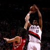 PORTLAND, OR - APRIL 28:  LaMarcus Aldridge #12 of the Portland Trail Blazers shoots against Luis Scola #4 of the Houston Rockets during Game 5 of the Western Conference Quarterfinals of the NBA Playoffs on April 28, 2009 at the Rose Garden in Portland, O