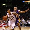 EAST RUTHERFORD, NJ - MARCH 27:  Devin Harris #34 of the New Jersey Nets drives against Derek Fisher #2 of the Los Angeles Lakers during the game on March 27, 2009 at the Izod Center in East Rutherford, New Jersey. NOTE TO USER: User expressly acknowledge