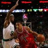 BOSTON - MAY 02:  Derrick Rose #1 of the Chicago Bulls drives to the net as Rajon Rondo #9 of the Boston Celtics defends in Game Seven of the Eastern Conference Quarterfinals during the 2009 NBA Playoffs at TD Banknorth Garden on May 2, 2009 in Boston, Ma