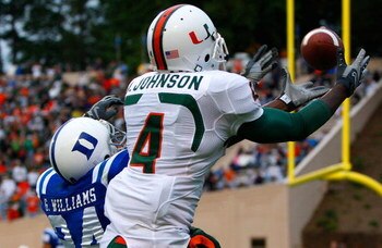 DURHAM, NC - OCTOBER 18:  Receiver Aldarius Johnson #4 of the Miami Hurricanes pulls in this touchdown reception against Glenn Williams #24 of the Duke Blue Devils during the game at Wallace Wade Stadium on October 18, 2008 in Durham, North Carolina.  (Ph