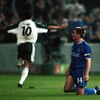 28 Sep 2000:  Ionel Gane of St Gallen celebrates as a dejected Captain Greama Le Saux of Chelsea during the UEFA Cup First leg second round match between St Gallen and Chelsea played at the Hardturm Stadium in Zurich. Mandatory Credit: Graham Chadwick/ALL
