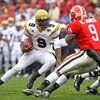 ATHENS, GA - NOVEMBER 29:  Quarterback Josh Nesbitt #9 of the Georgia Tech Yellow Jackets ran for 48 yards during the game against the Georgia Bulldogs at Sanford Stadium on November 29, 2008 in Athens, Georgia.  The Yellow Jackets beat the Bulldogs 45-42