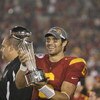 PASADENA, CA - JANUARY 1:  Mark Sanchez #6 of the USC Trojans smiles as he holds the Rose Bowl Trophy after the game against the Penn State Nittany Lions on January 1, 2009 at the Rose Bowl in Pasadena, California.  USC won 38-24.  (Photo by Jeff Golden/G