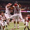 NEW ORLEANS - JANUARY 02:  Wide receiver Brent Casteel #5 of the Utah Utes reacts with teammate Zane Beadles after Casteel scores a six-yard touchdwon against the Alabama Crimson Tide during the first quarter of the 75th Allstate Sugar Bowl at the Louisia
