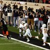 LUBBOCK, TX - NOVEMBER 01:  Michael Crabtree #5 of the Texas Tech Red Raiders carries the ball into the end zone to score the winning touchdown during the game against the Texas Longhorns on November 1, 2008 at Jones Stadium in Lubbock, Texas.  (Photo by 