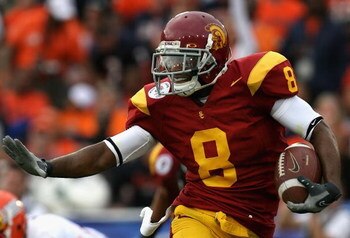 PASADENA, CA - JANUARY 01: Wide receiver Ronald Johnson #8 of the USC Trojans runs with the ball against the Illinois Fighting Illini during the Rose Bowl presented by Citi at the Rose Bowl on January 1, 2008 in Pasadena, California. The Trojans defeate