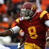 PASADENA, CA - JANUARY 01:  Wide receiver Ronald Johnson #8 of the USC Trojans runs with the ball against the Illinois Fighting Illini during the Rose Bowl presented by Citi at the Rose Bowl on January 1, 2008 in Pasadena, California.  The Trojans defeate