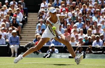 LONDON - JULY 03:  Elena Dementieva of Russia plays a forehand during the women's singles Semi Final match against Venus Williams of United States on day ten of the Wimbledon Lawn Tennis Championships at the All England Lawn Tennis and Croquet Club on Jul