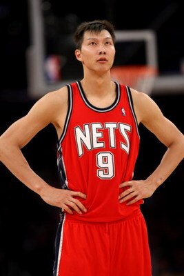LOS ANGELES, CA - NOVEMBER 25:  Yi Jianlian #9 of the New Jersey Nets rests during a break in the game against the Los Angeles Lakers on November 25, 2008 at Staples Center in Los Angeles, California. The Lakers won 120-93.   NOTE TO USER: User expressly 