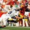 PASADENA, CA - JANUARY 01:  Damian Williams #18 of the USC Trojans runs for yardage past Mark Rubin #9 of the Penn State Nittany Lions during the 95th Rose Bowl Game presented by Citi on January 1, 2009 at the Rose Bowl in Pasadena, California.  (Photo by