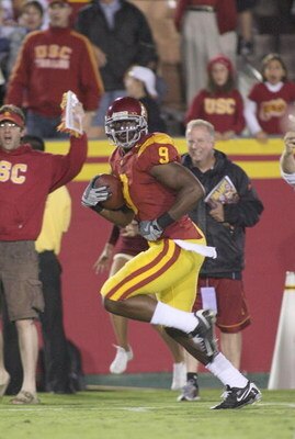 LOS ANGELES - OCTOBER 4:  David Ausberry of the USC Trojans runs after a catch for a 59 yard touchdown against the Oregon Ducks in the fourth quarter of the game on October 4, 2008 at the Los Angeles Memorial Coliseum in Los Angeles, California.  USC won 