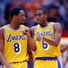 31 Oct 1997:  Guards Kobe Bryant (left) and Eddie Jones of the Los Angeles Lakers talk during a game against the Utah Jazz at the Great Western Forum in Inglewood, California.  The Lakers won the game 104-87. Mandatory Credit: Aubrey Washington  /Allsport