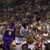 15 Jun 2001:  Aaron McKie #8 of the Philadelphia 76ers drives to the basket against the defense of Kobe Bryant #8 of the Los Angeles Lakers in game five of the NBA Finals at the First Union Center in Philadelphia, Pennsylvania.  The Lakers won 108-86 to t